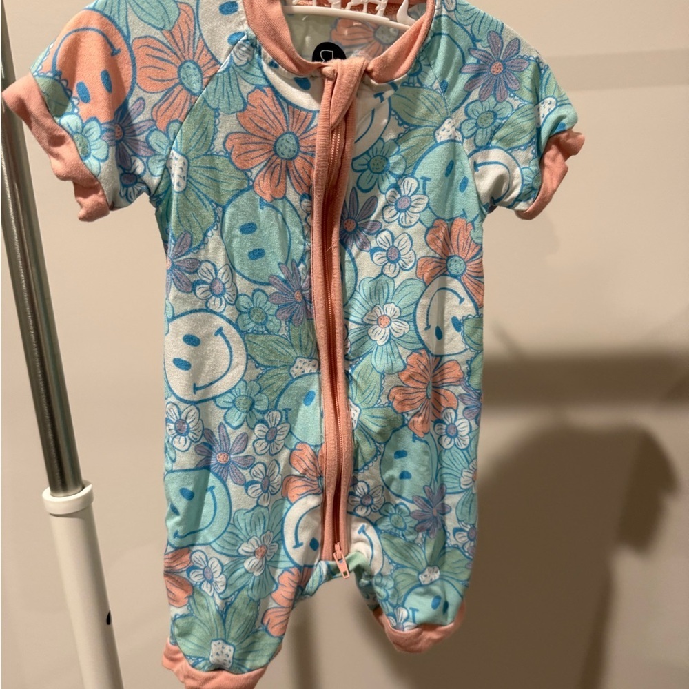 Bamboo Floral Smiley zippy romper